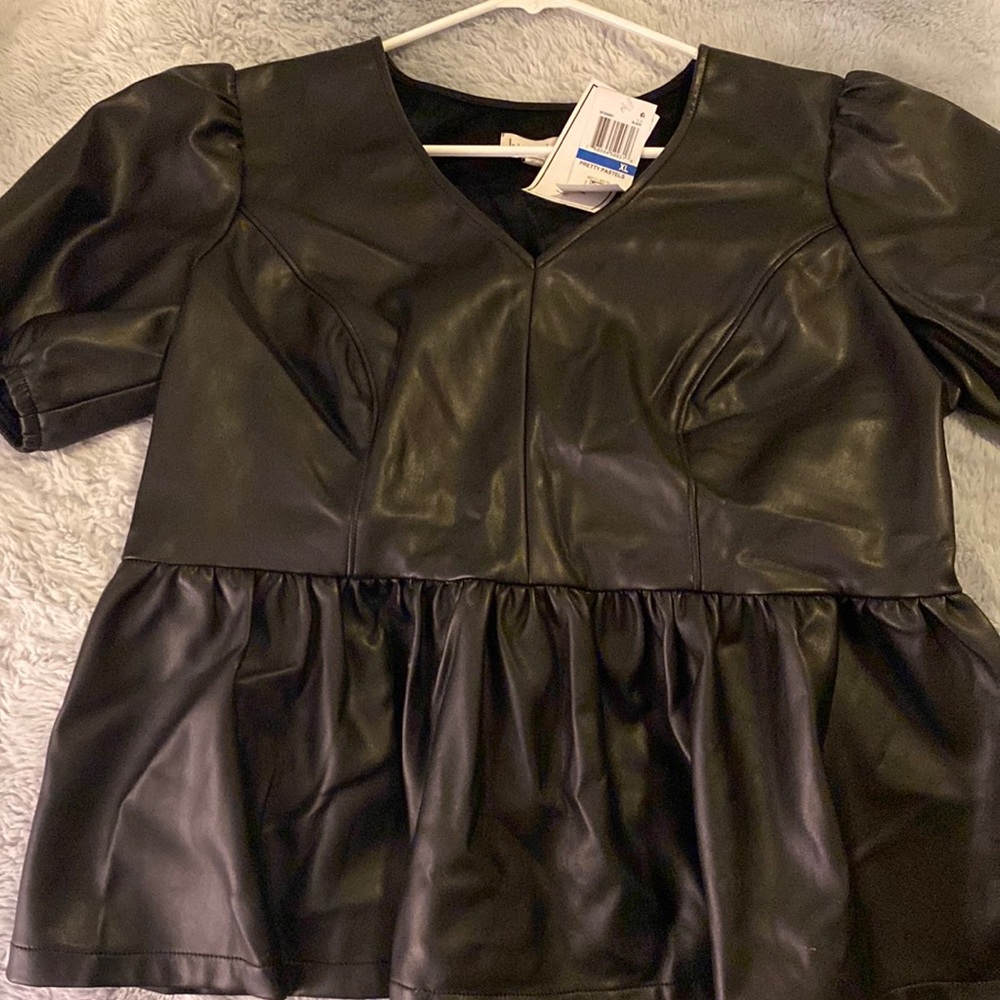 Black ruffled top